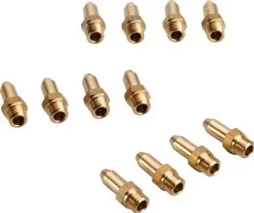 BOSCH-Gasumsatzset mit mehreren Messingdüsen, die zur Umwandlung von Gasgeräten verwendet werden. Verschiedene Größen und Formen erkennbar.